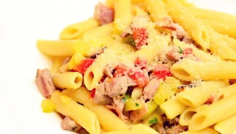 Penne on white background 库存照片