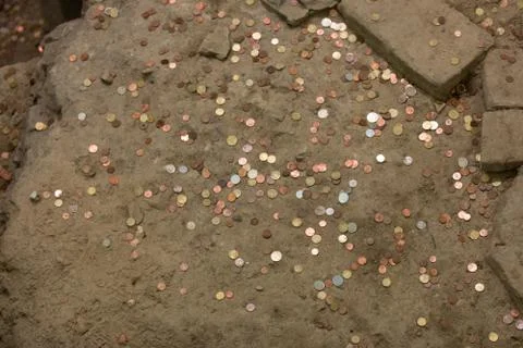Pennies  in the ground Stock Photos