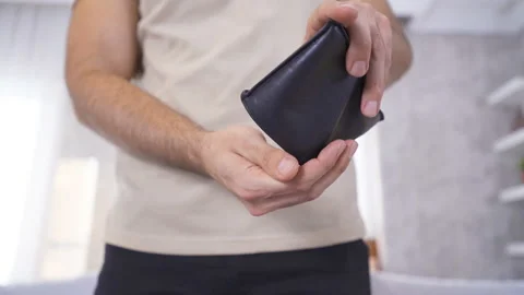 The penniless man's wallet is empty. Video stock 213584921