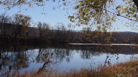 Pennsylvania reflections in the Delaware River Stock Footage 129195393