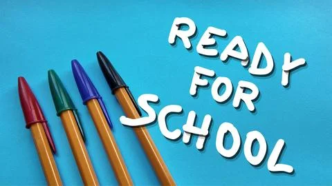 Pens and white text ready for school symbolizing education and learning Stock Photos