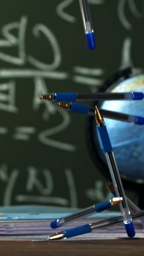Pens fall on the school desk. Filmed on a high-speed camera at 1000 fps Stock Footage 335366002
