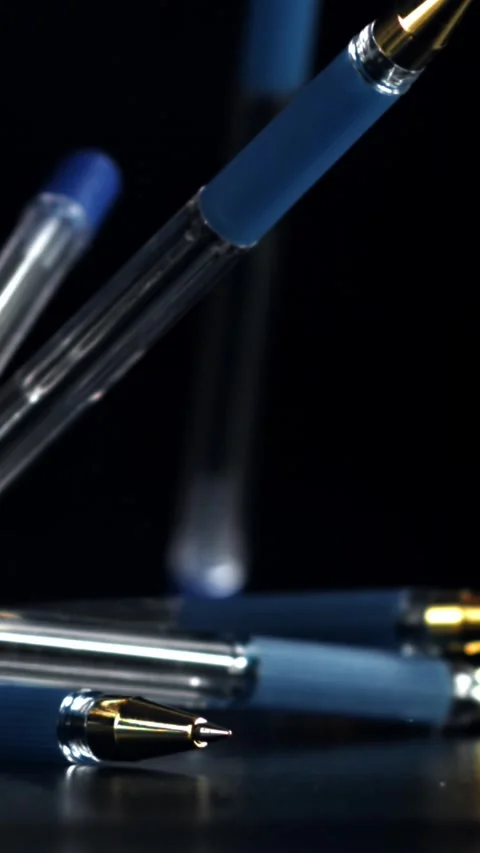Pens fall on the table. Filmed on a high-speed camera at 1000 fps Stock Footage 335376246