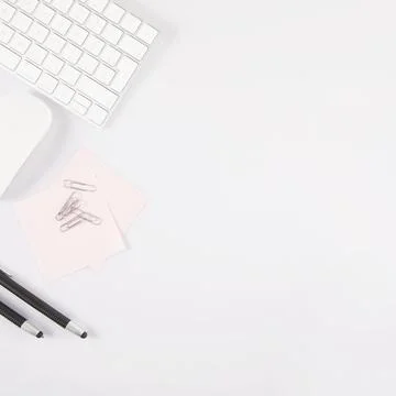 Pens sticky notes near keyboard mouse . High quality and resolution beautiful Stock Photos