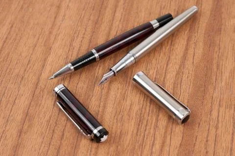 Pens on the table Stock Photos