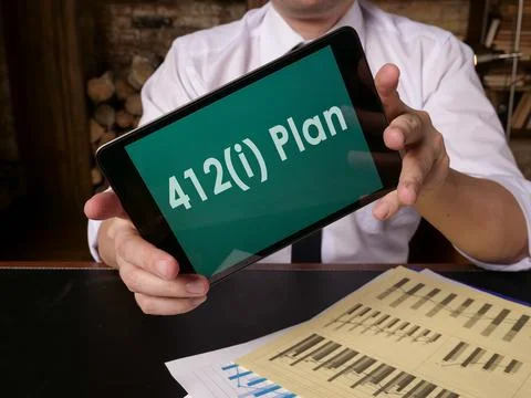 Pension 412i plan data on the tablet. Stock Photos