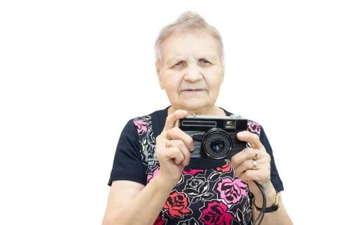 Pensioner with a camera Stock Photos