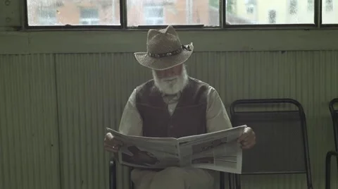 Pensioner Reading Newspaper Stock Footage 64146412