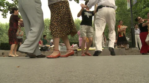 Pensioners dancing in Park Stock Footage 37702184
