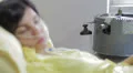 pensive and sad woman in the hospital for lung cancer HD Footage
