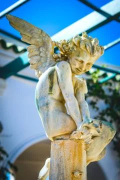 Pensive angel sitting Stock Photos