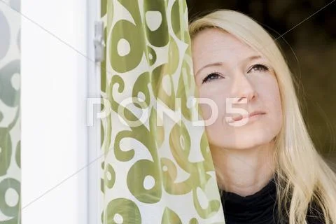 Pensive attractive blonde woman, 35+ Stock Photos