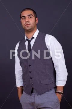 Pensive business man portrait on black background Stock Photos