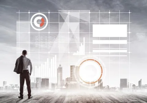 Pensive businessman looking at user interface against modern cit Foto stock