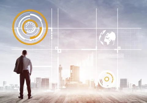 Pensive businessman looking at user interface against modern city background Stock Photos