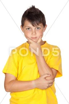 Pensive child with yellow t-shirt Stock Photos
