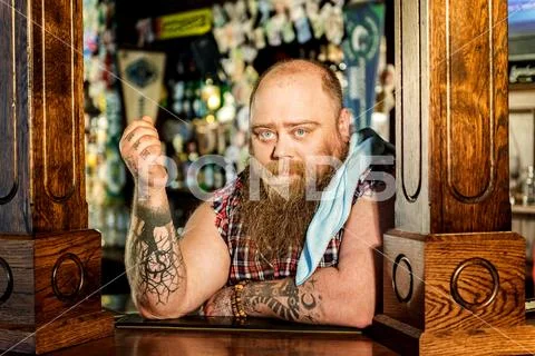 Pensive fat man reclining on workplace Stock Photos
