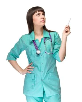 Pensive female doctor having an idea, showing copy space isolated on white Stock Photos