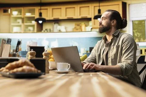 Pensive freelancer in reflection thinking about problem solving and ideas Stock Photos