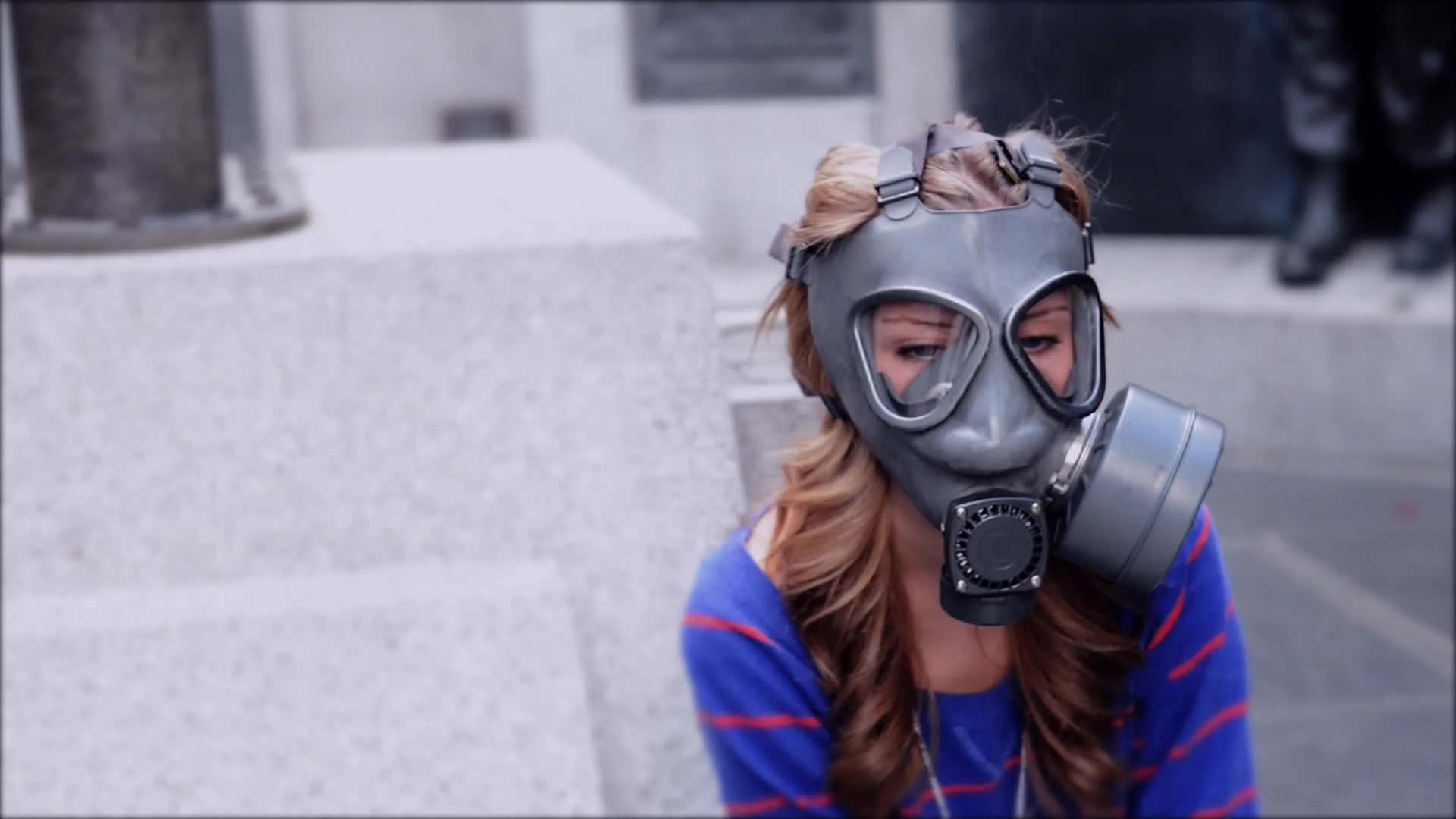 girl wearing gas mask