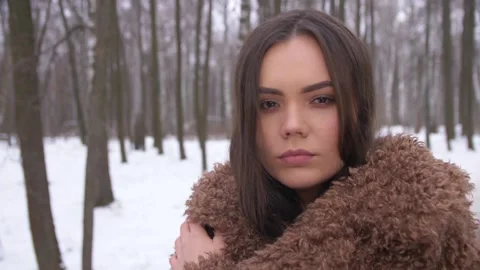 Pensive Girl Posing on Camera.  Winter. Close-up Stock Footage 163465892