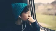 Pensive Girl On Train Looking Through Window Stock Footage