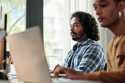 Pensive Indian Programmer Working Stock Photos