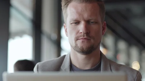 Pensive man closing laptop computer Video stock 111758743