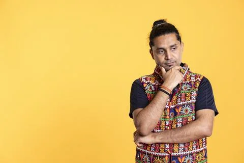Pensive man deep in thoughts, doing ruminating hand gesturing, Stock Photos