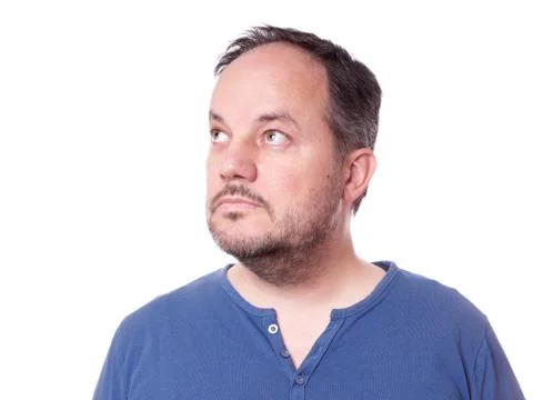 Pensive man looking up Stock Photos