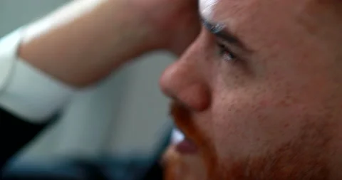 Pensive man looking for solution to problem, redhair guy seeking help of God  Stock Footage 132249394