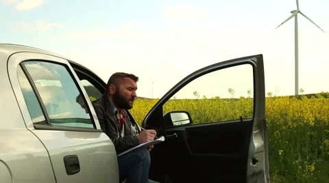 Pensive man note, sitting in car Stock Footage 62861650