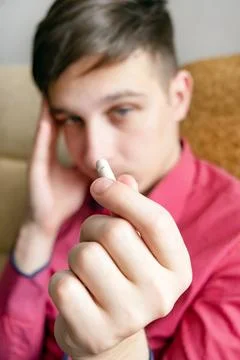 Pensive Man with a Pill Foto stock