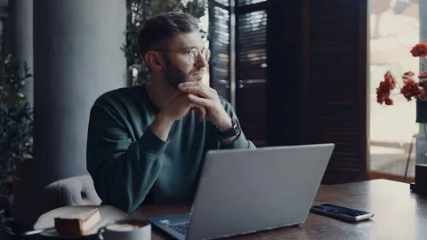 Pensive Man Sitting Alone In Cafe, Writer Or Journalist Freelancer Working Stock-Footage 343669435