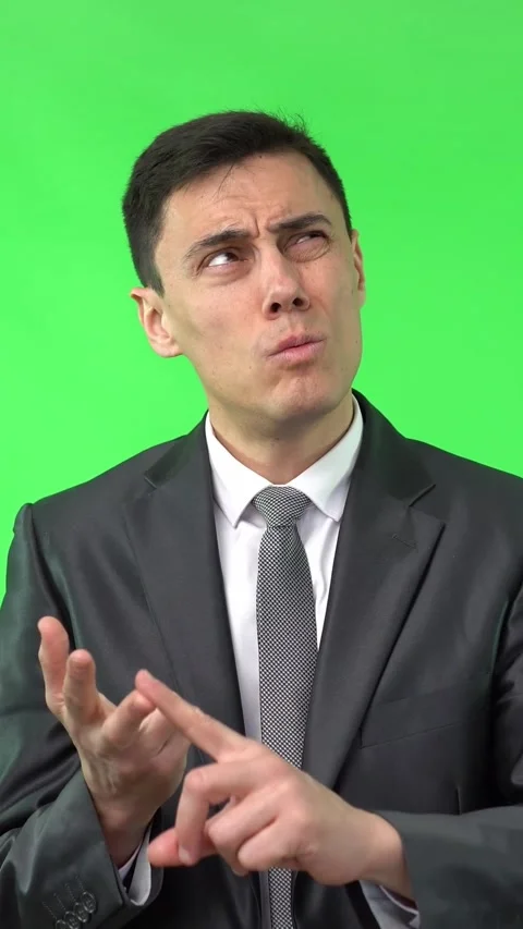 Pensive man in suit counting in studio Vídeos de archivo 246270479