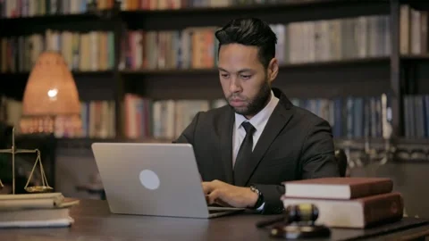 Pensive Middle Aged Lawyer Working on Laptop Stock Footage 293250602