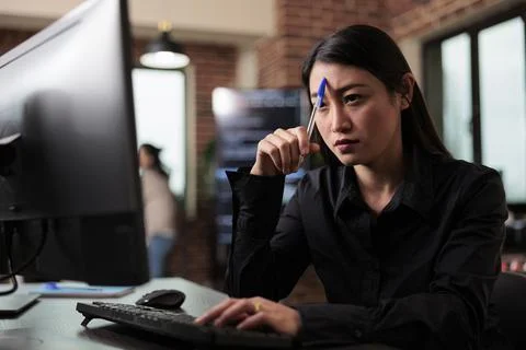 Pensive network engineer reflecting at failed data processing operation 스톡 사진