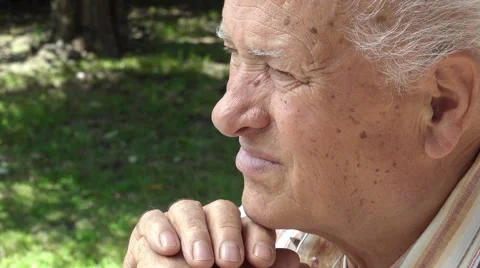 Pensive old man looking in the camera: thoughtful elder man Stock-Footage 64303123