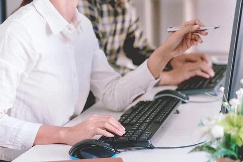 Pensive programmer working on desktop pc programming code technologies or ... 스톡 사진