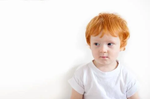 Pensive redhead boy Stock Photos