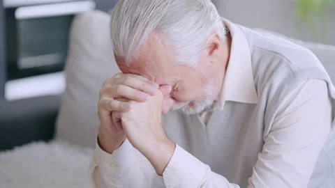Pensive retired man putting face in hands, upset with financial problems, tired Stock Footage 167225012