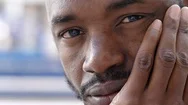Pensive Sad Handsome Black African Man Looking In Camera-Outdoor Stock Footage