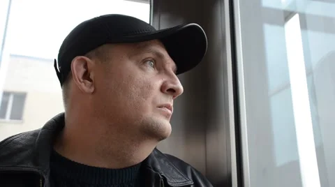 Pensive sad Man riding in an elevator Stock Footage 56448591