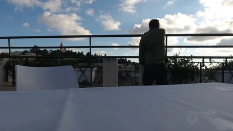 A Pensive Sad Man On A Terrace Stock Footage 90546961