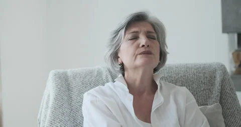 Pensive sad senior middle aged grandma worried depressed lonely at home from Stock Footage 160475855