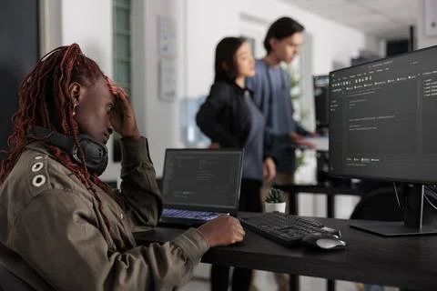 Pensive system engineer thinking at programming ideas trying to write html code 스톡 사진