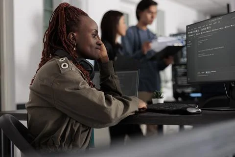 Pensive web developer thinking at software script development Foto stock