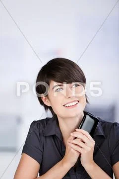 Pensive woman with her mobile Stock Photos