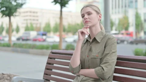 Pensive Woman Thinking While Sitting Out Stock Video Pond