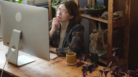 Pensive writer working from home. Remote worker thinking about problem solution Stock Footage 316767389